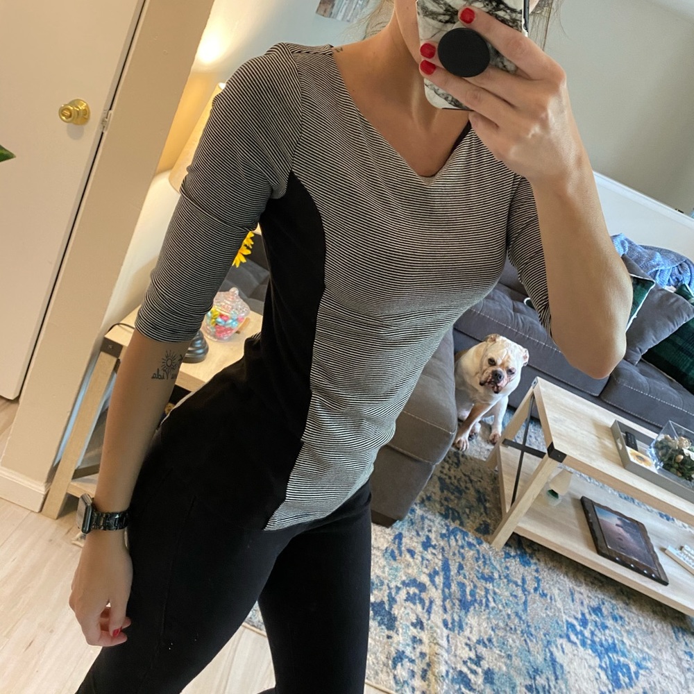 Women’s quarter sleeve shirt.